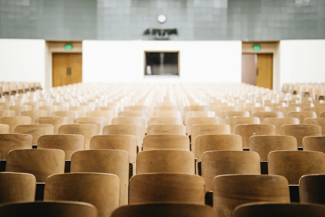 Rows of seats in a bright lecture hall